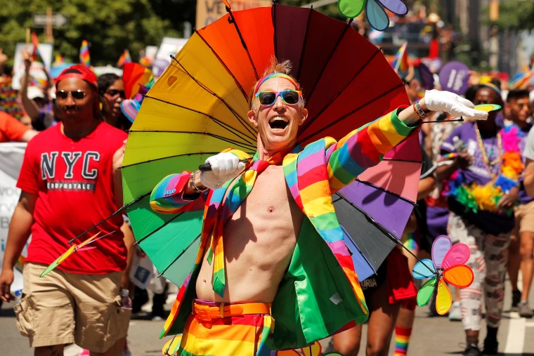 Person with rainbow umbrella