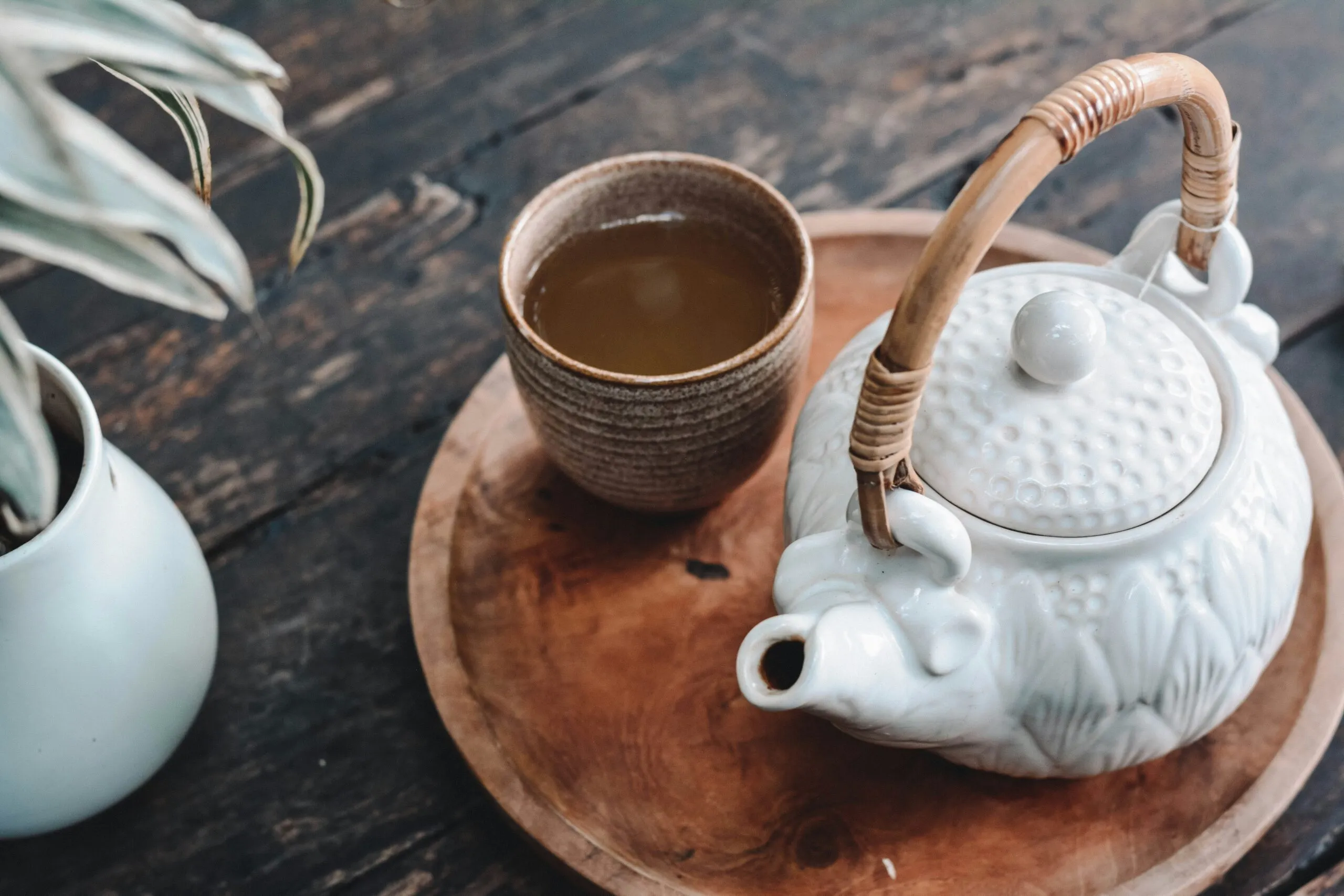 Cup of tea with teapot