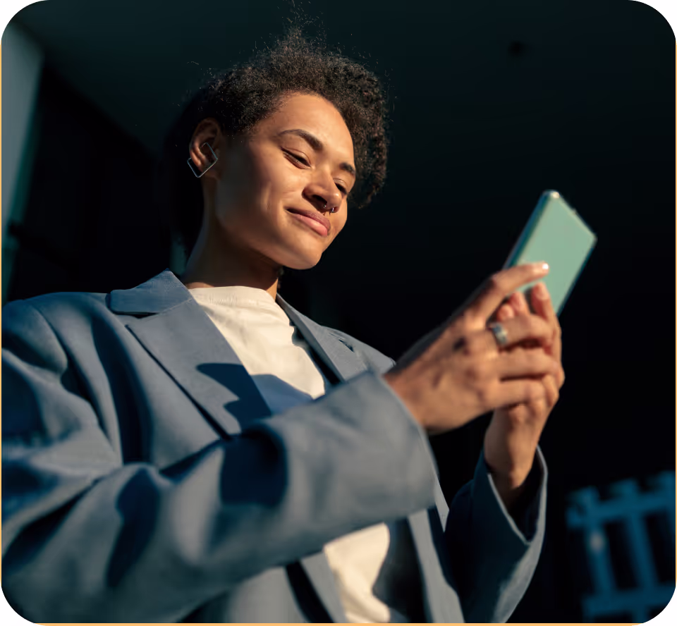 a photo of a woman using her mobile phone