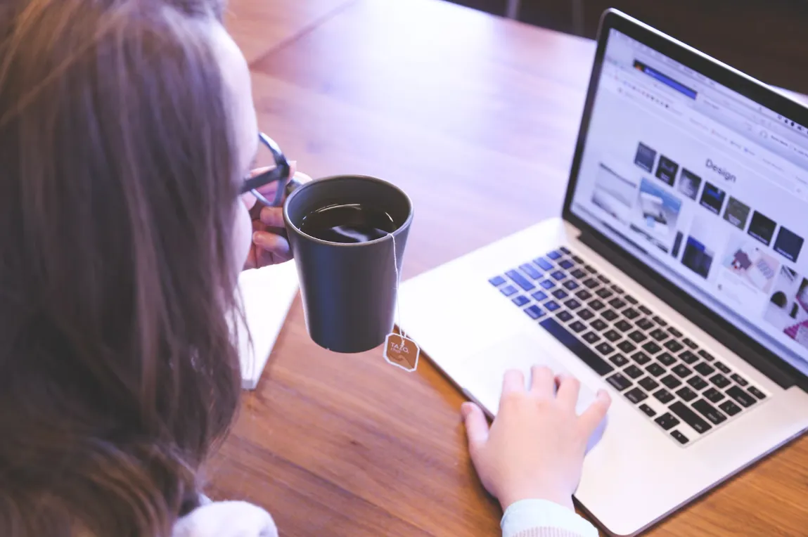 Professional woman using laptop