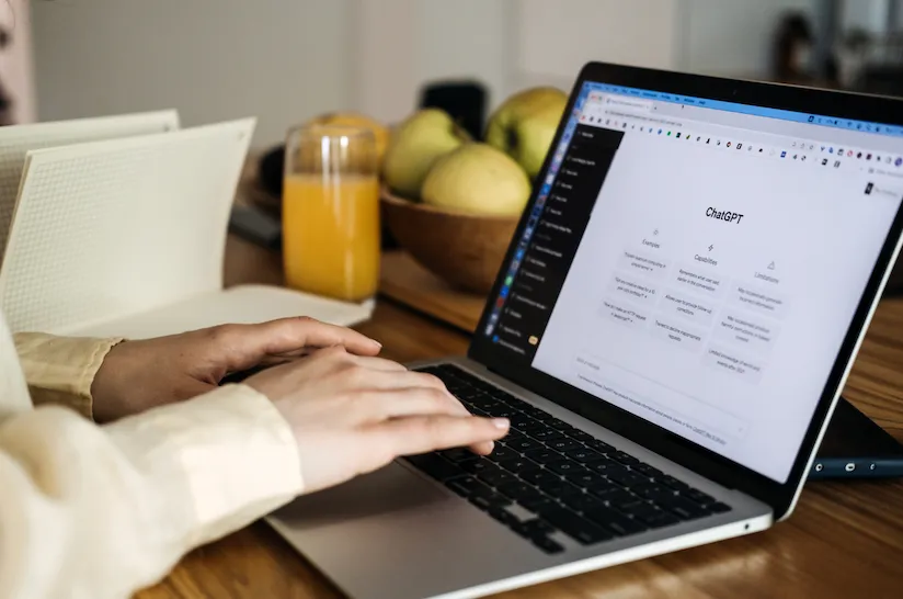 Professional woman using laptop