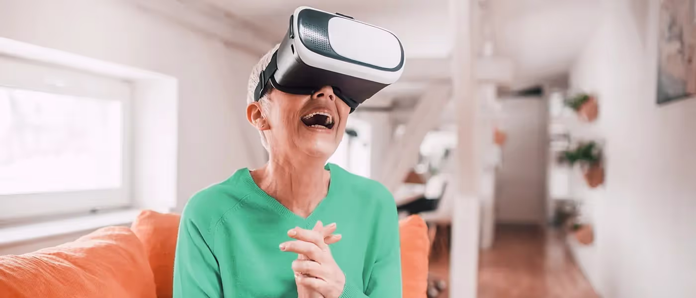 Old woman using VR headset