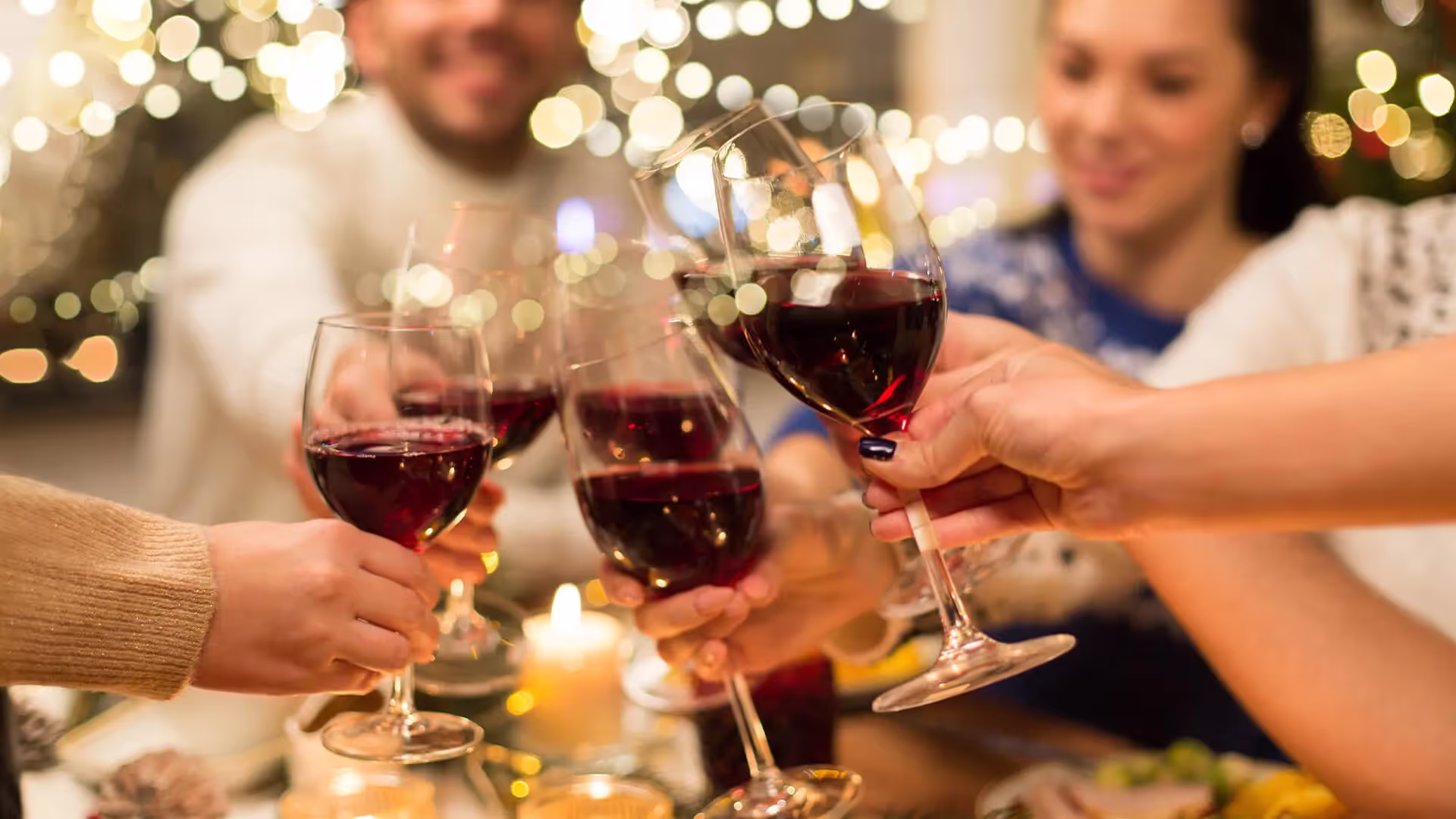 People celebrating with wine